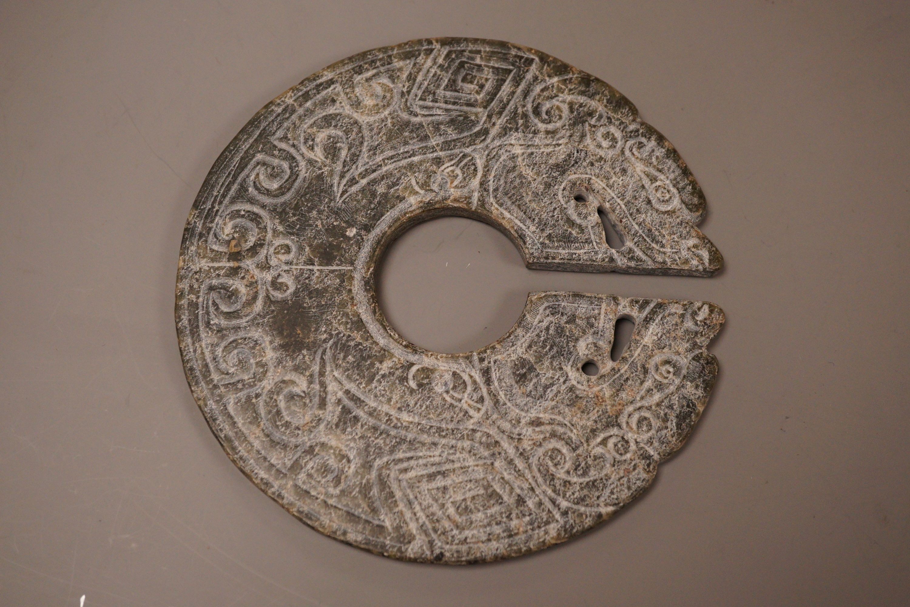 A Chinese stone huang disc